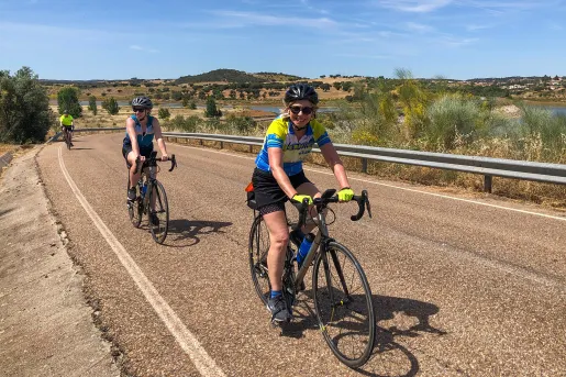 Three bikers riding on a road in Portugal.