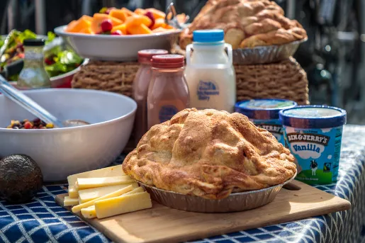 Shot of pie, ice cream, cheese, milk, salad, etc.