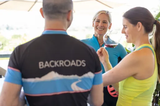 Three guests at wine tasting.