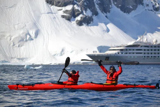 Kayakers in the icy waters of Antarctica