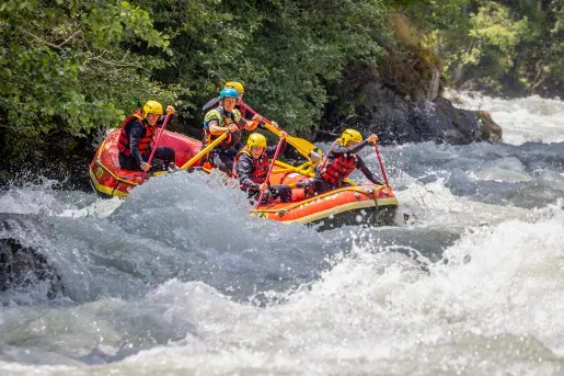 Five guests white water rafting.