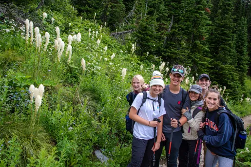 Backroads family smiling while hiking 