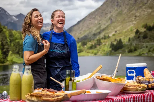 Two leaders with a prepared Backroads picnic