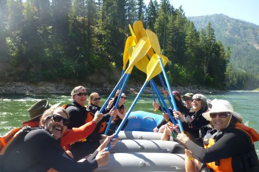 Backroads guests smiling while white water rafting