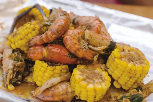 Close-up of shrimp boil ingredients.