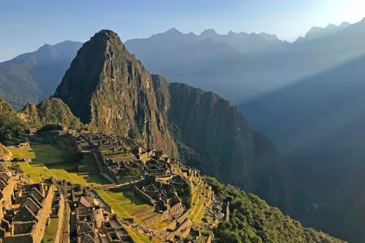 Wide shot of Machu Picchu during sunset.