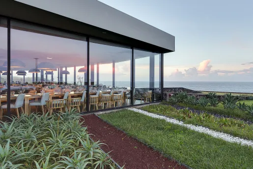 exterior of hotel with floor to ceiling windows