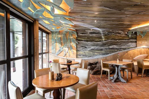 hotel dining room with decorated ceilings 