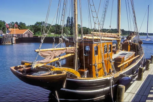 Small ship docked at a port 