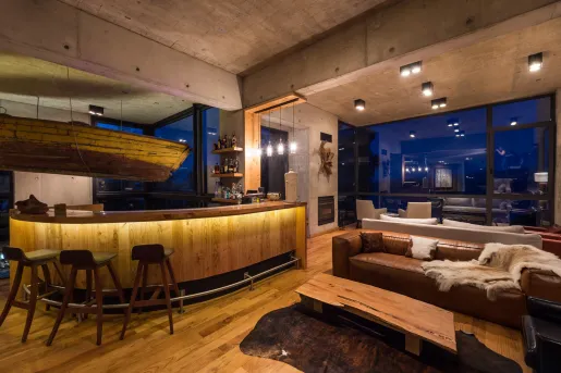 bar and couches in dimly lit room