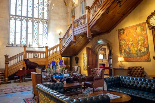 Grand hotel lobby with leather couches