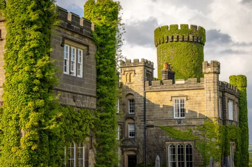 stone building covered in ivy