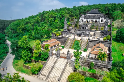 A temple with many steps built into a mountain side
