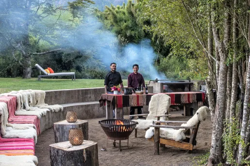 chefs at an outdoor barbeque 