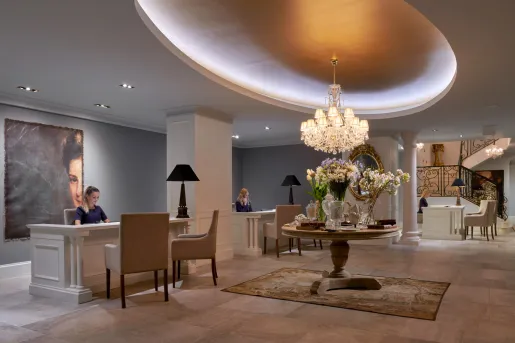 receptionists working in a hotel lobby