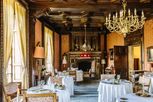 rustic dining area with fireplace