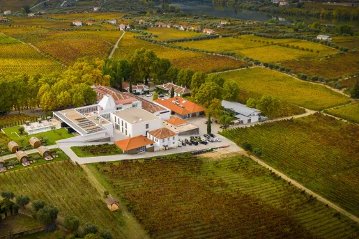 Birds eye view of hotel surrounded by grassland