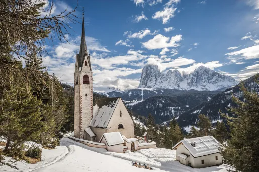 Snow covers a church
