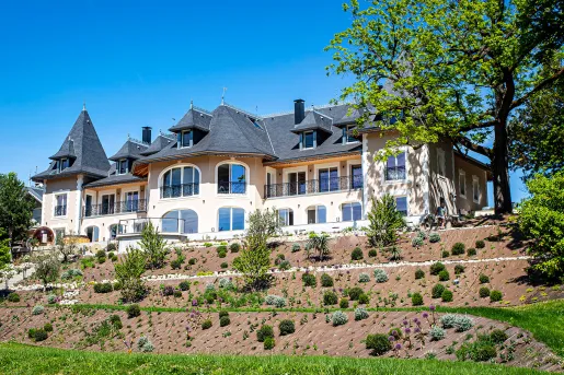 Outdoor view of hotel on a small hill