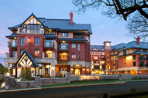 Oak Beach Hotel lit up at dusk
