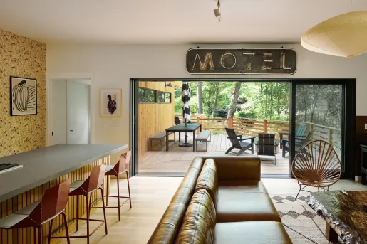 leather couch and wooden bar with large motel bar