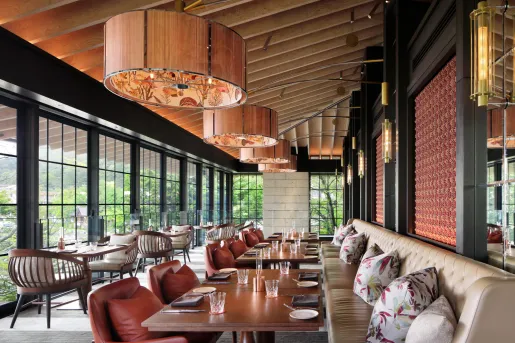 Hotel dining room with sloped wood ceilings
