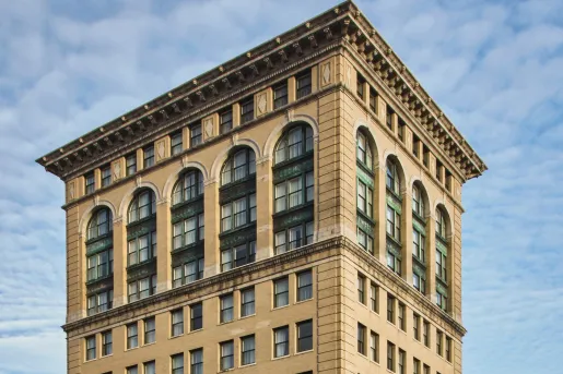 Exterior view of a hotel building's top floors