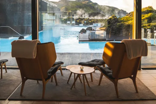 Chairs overlooking blue lagoon water