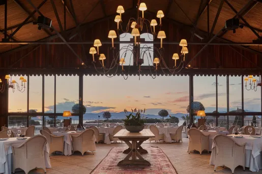 open air dining room with view of sunset