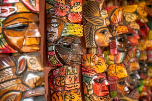 Carved, wooden mini totem poles