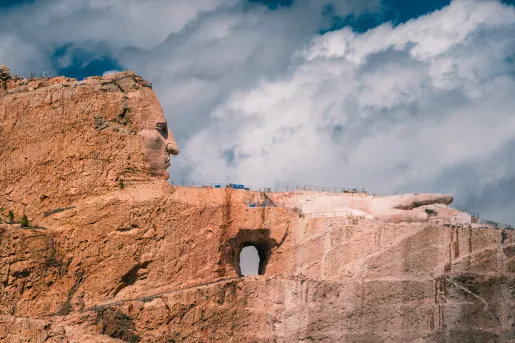 canyons against a blue cloudy sky