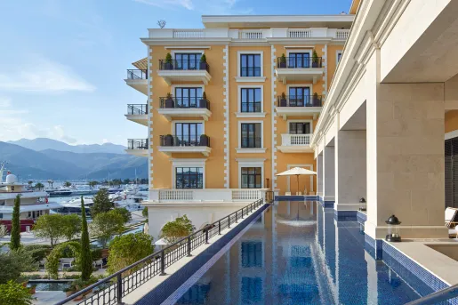 narrow swimming pool off of hotel