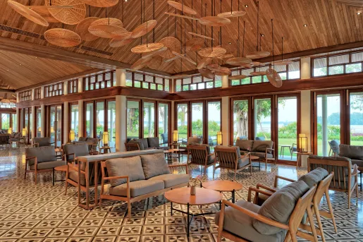 room with tiled floors and lounge furniture