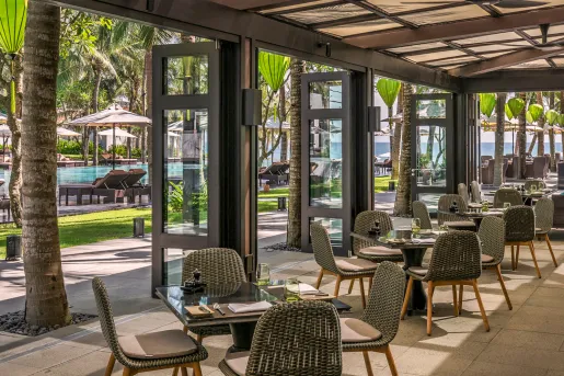 Open air dining room overlooking the pool
