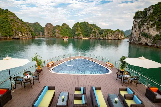 helm of boat with hot tub floating on river