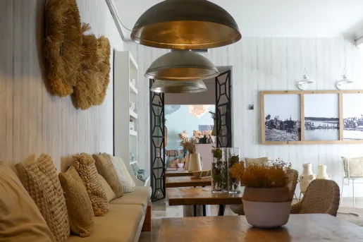 Lobby with tab cushions on a bench and wooden furniture