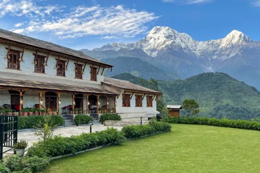 sprawling lawn with hotel in background