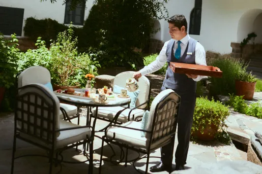 waiter setting table outside