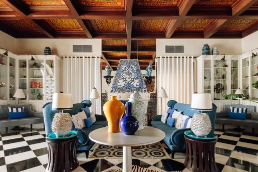 colorful sitting room with blue couches