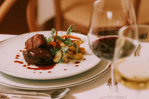 Dinner and glasses of wine