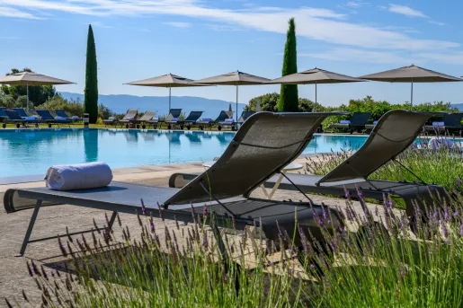 lounge chairs by the pool