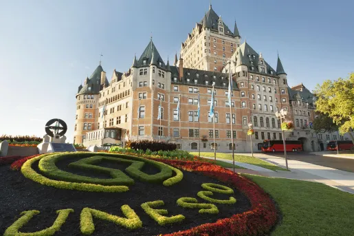 large hotel with manicured lawns