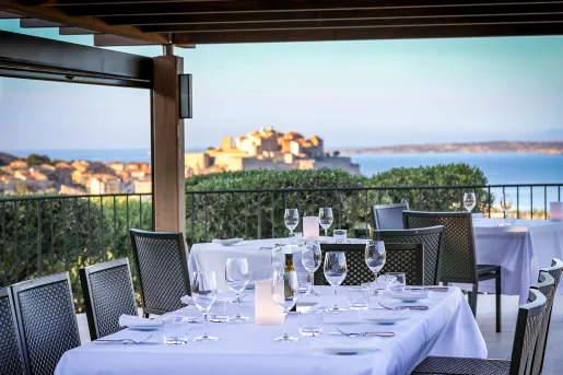 table with settings overlooking sunset