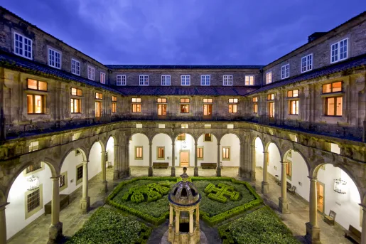 Outdoor courtyard with an antique stature in the center
