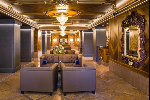 ornate hotel lobby and chandeliers