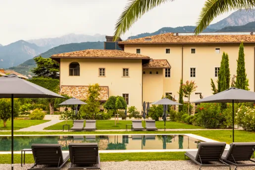 Yellow building with an outdoor pool