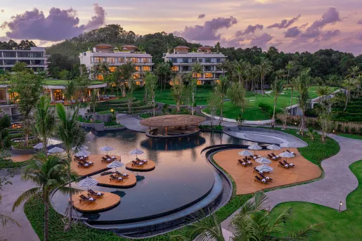 Exterior view of hotel grounds and swimming pool