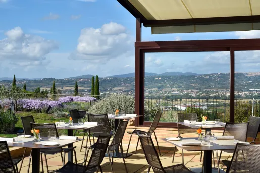 patio with dining furniture and view