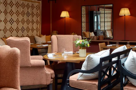 pink chairs around a table