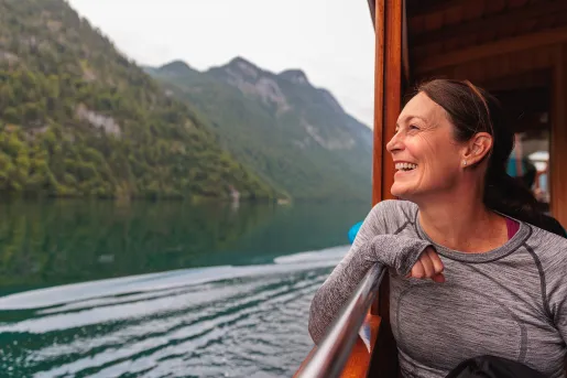 a person looking out onto the water from a boat